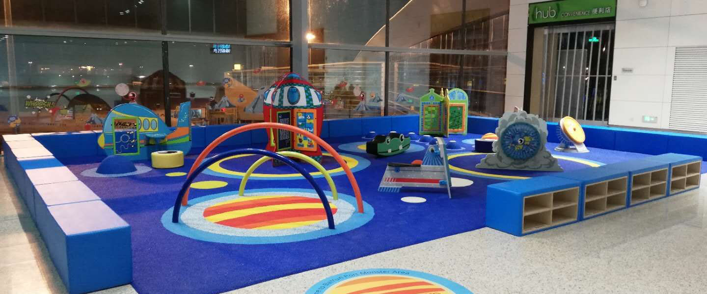 This image shows a custom kids corner at an airport