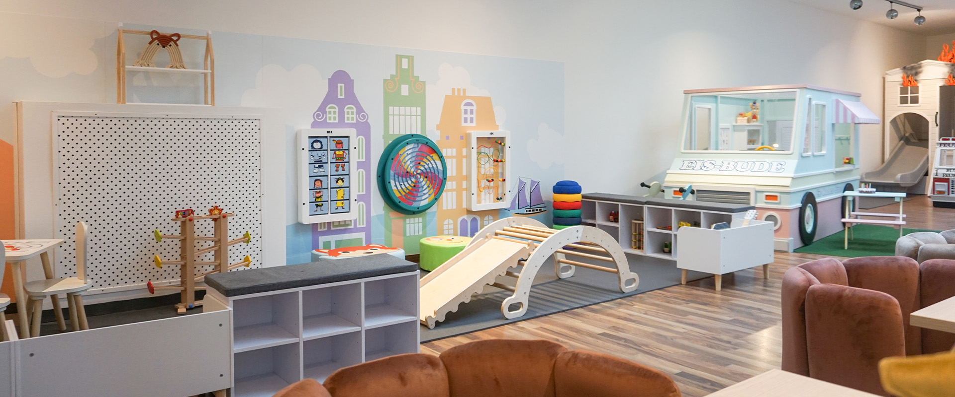 IKC speelhoek voor kinderen in kindercafe Bude Eins in Pempelfort Duitsland