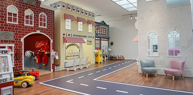 IKC play corner with kitchen for children in children's cafe Bude Eins in Pempelfort Germany