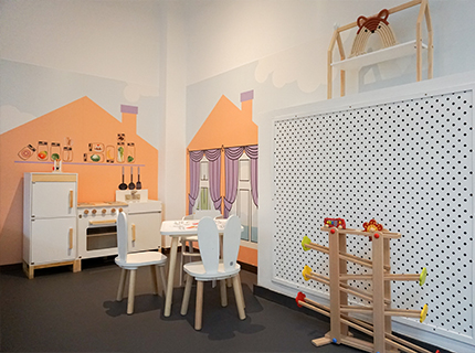 IKC play corner with kitchen for children in children's cafe Bude Eins in Pempelfort Germany