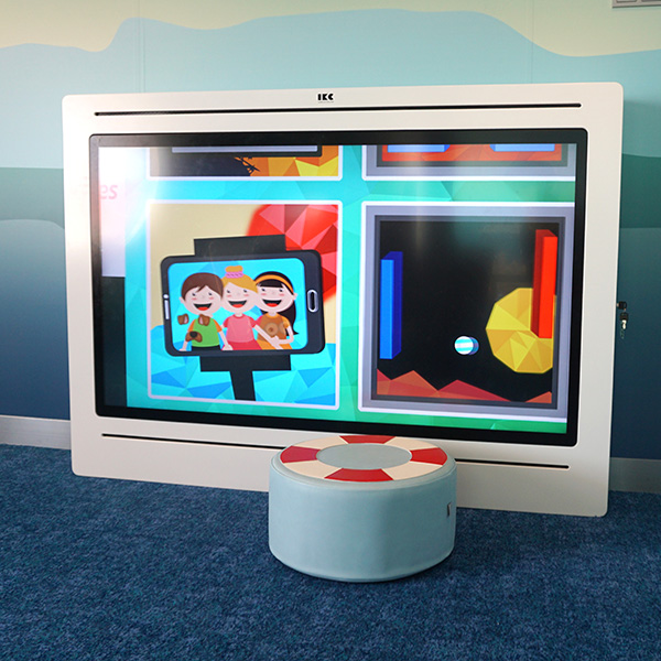 Large interactive play system with touchscreen for children