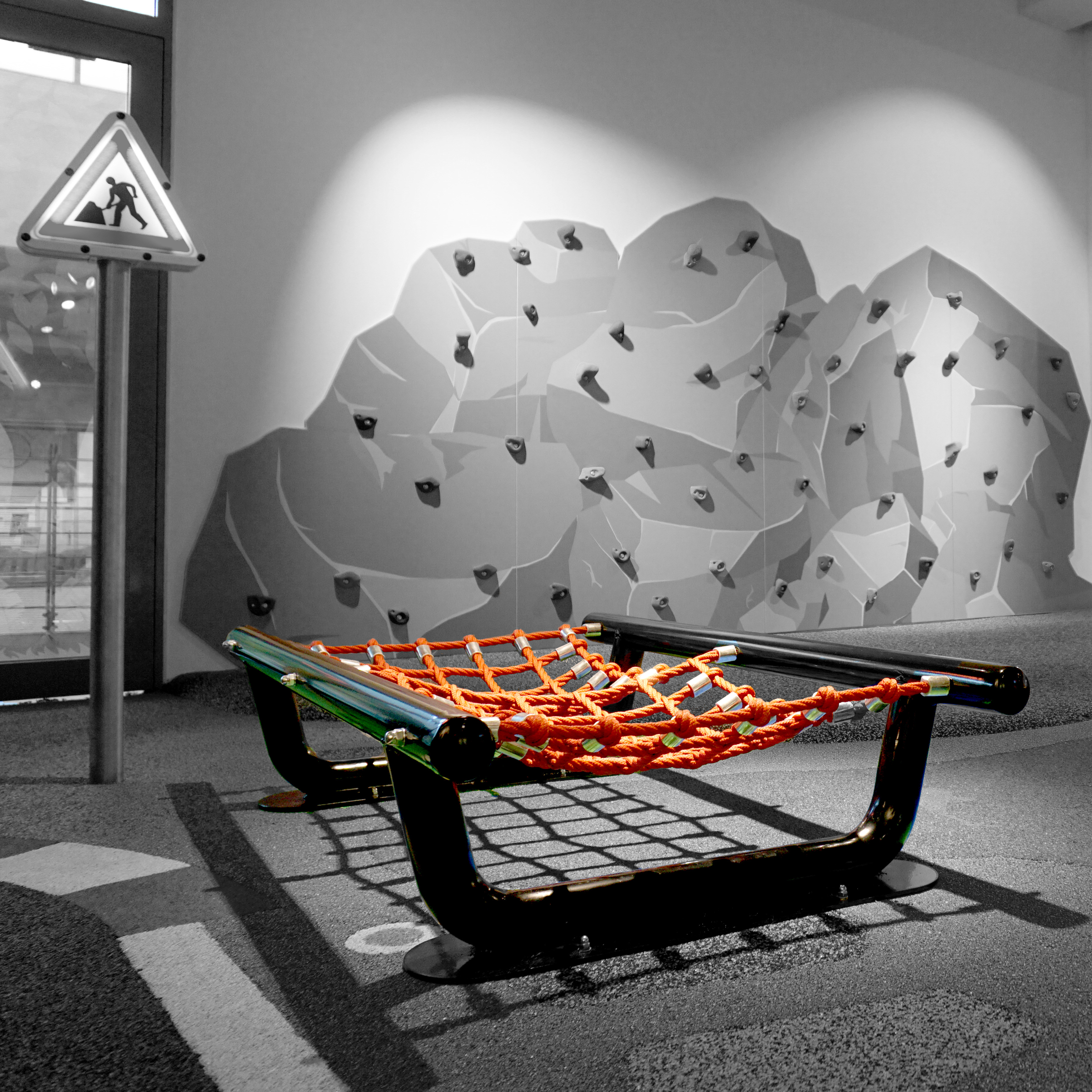 A rope bridge for a children's corner, playground or other play area to climb and balance on