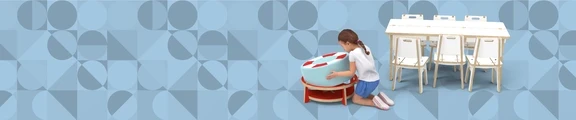 On this image you can see a kids' corner with kids' furniture